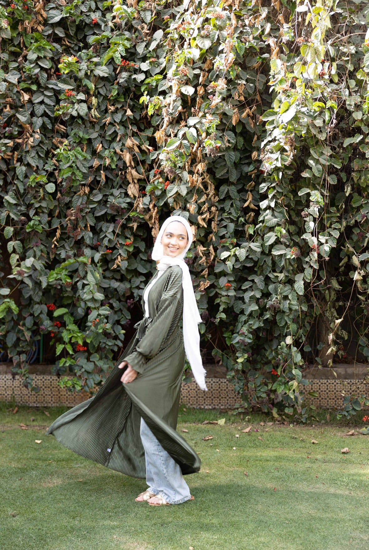 Pleated silk kimono in olive
